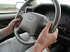 hand on driving wheel