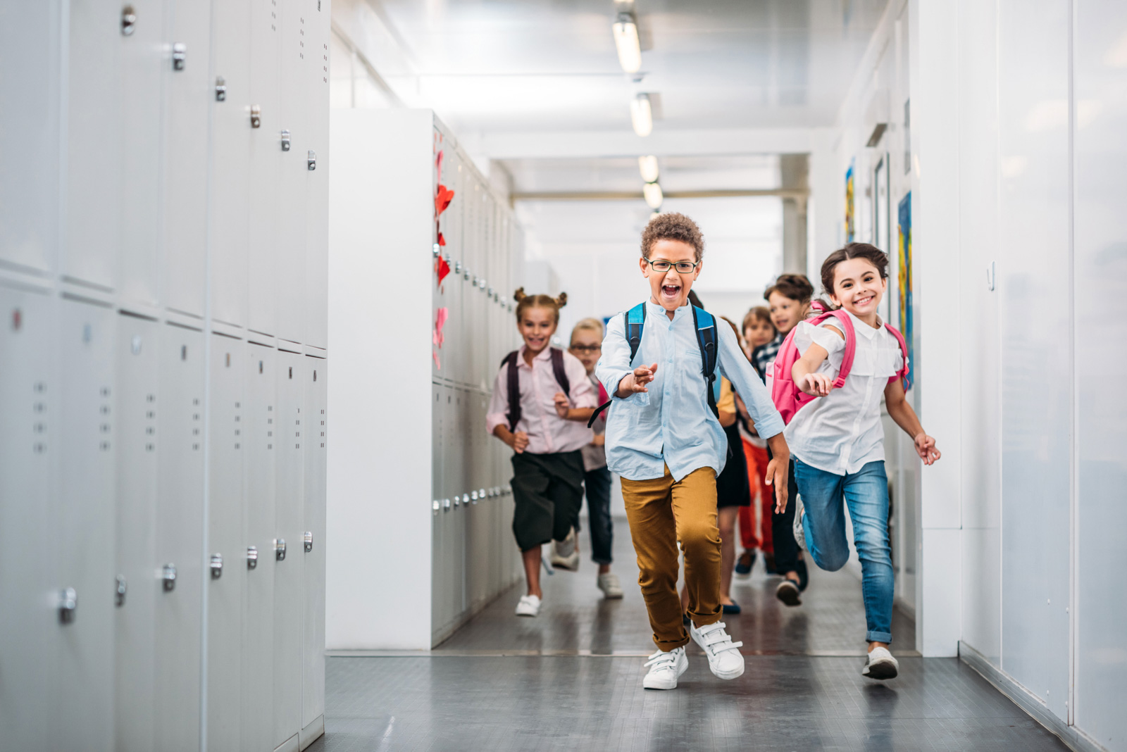 kids running in school hallway